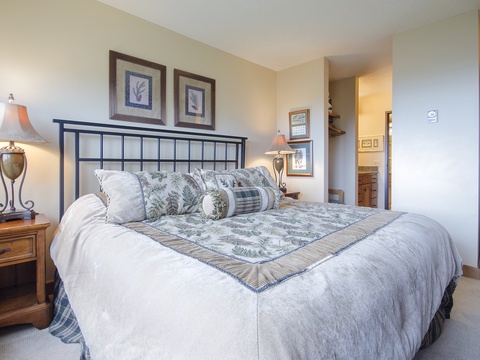 Sink into plush bedding beneath stylish artwork and soft lamplight. Your private retreat features elegant decor and thoughtful touches for a peaceful night's rest.