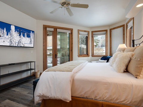 Sink into a plush bed while gentle breezes flow in through your private balcony doors. With warm wood accents and crisp linens, this retreat makes unwinding effortless after a day of exploration.