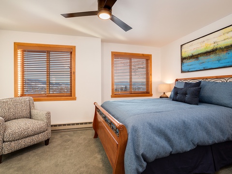 Drift off to sleep in your cozy bedroom, where soft linens and a peaceful color palette invite restful nights. A gentle ceiling fan keeps things comfortable year-round.