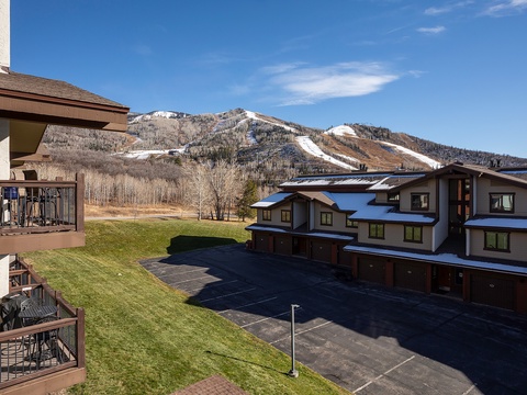 Mountain resort community set against snow-dusted peaks and ski runs, offering convenient access to alpine adventures and scenic natural beauty.