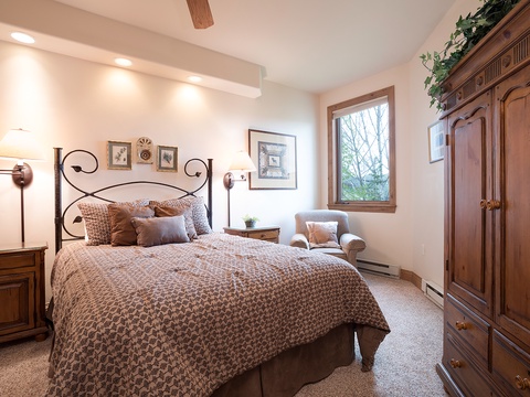 Sink into the plush, inviting bed after a day of adventure, and let the natural light from your private window and cozy furnishings wrap you in comfort.