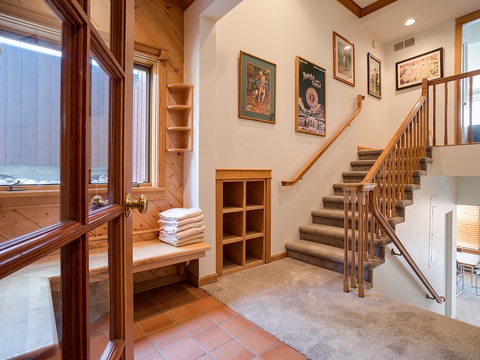 Step inside and feel the warmth of rich wood details and mountain charm. Fresh towels await you by the staircase, and vintage art adds character to your home away from home.