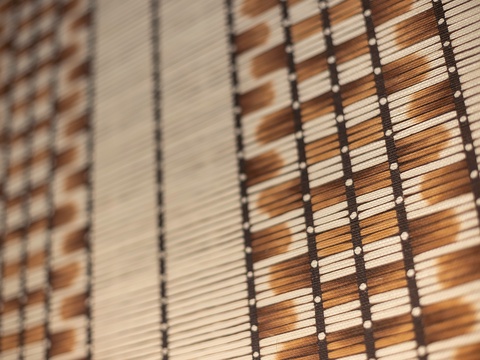 Natural bamboo blinds add texture and warmth to your space, filtering sunlight into soft, inviting patterns that create a peaceful, relaxed atmosphere.
