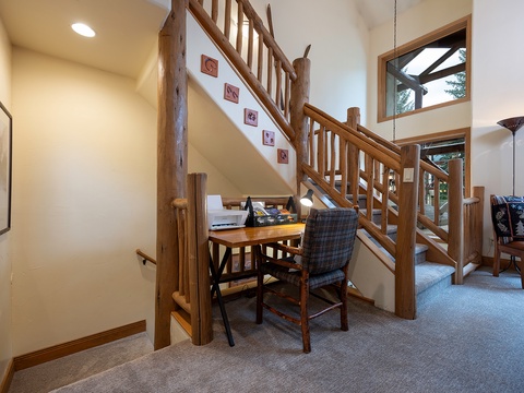 Warm, rustic charm meets mountain elegance in this inviting space, where natural wood accents and soaring ceilings create the perfect retreat for your getaway.