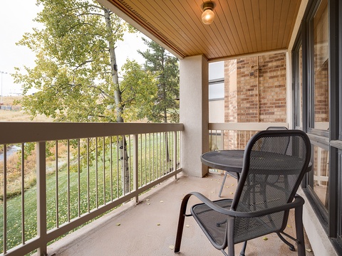 Relax on your private balcony with serene views of trees and greenery—a peaceful retreat where you can unwind with morning coffee or enjoy the fresh air anytime.