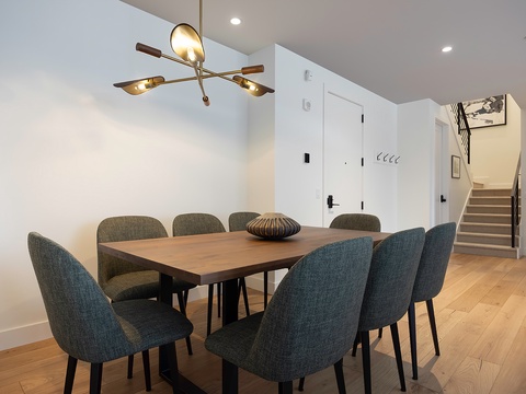 Gather around this spacious dining table with comfortable seating for eight, perfect for your group meals and memorable conversations together.