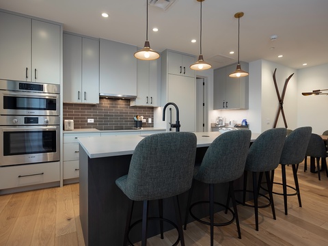 Gather with friends and family in this inviting open-concept kitchen and dining area, complete with a spacious island, modern appliances, and thoughtful finishes that make cooking and conversation effortless.