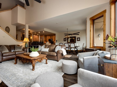 Sink into rich leather sofas and plush seating where rustic wood meets mountain elegance. Your open-concept retreat flows effortlessly from cozy living spaces to the gourmet kitchen—perfect for gathering and unwinding.