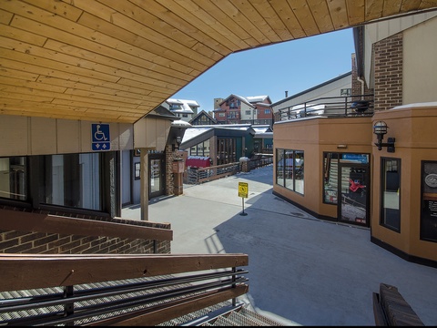 The property is part of a ski village community featuring alpine-style architecture, shared pathways, and convenient access to local shops and restaurants—all within walking distance of your accommodation.
