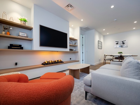 Settle into modern comfort with plush seating, a sleek fireplace, and an open layout that flows seamlessly from relaxing to dining. Your perfect retreat awaits.