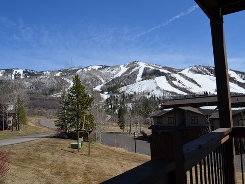 Expansive ski mountain vistas frame the property, with runs and lifts spread across snow-covered peaks—a stunning backdrop for your mountain getaway.