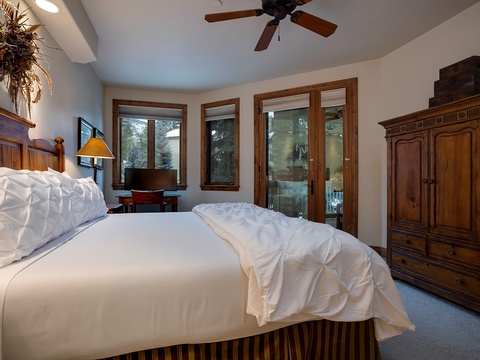 Drift into restful sleep surrounded by mountain views. Crisp linens, warm wood accents, and your own private balcony create a cozy alpine retreat where every morning feels refreshing.
