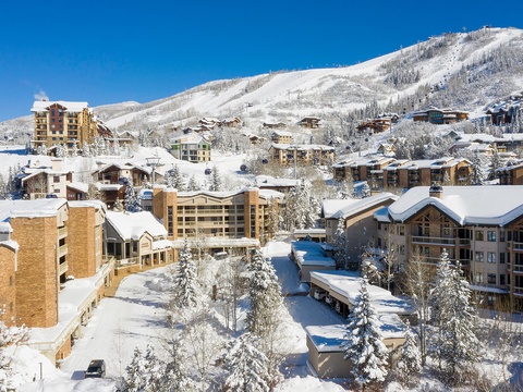 Nestled in a world-renowned ski resort, the property sits among snow-covered peaks and evergreens, offering easy access to alpine adventure and mountain village charm.
