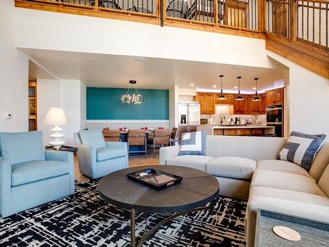 Sink into your comfortable living space with an open layout that flows seamlessly into the dining area and fully-equipped kitchen—perfect for gathering and creating vacation memories together.