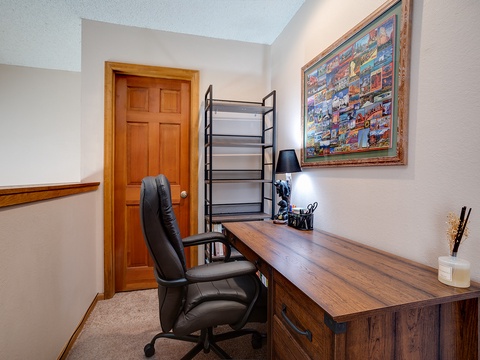 Stay productive in your own private workspace, complete with a spacious desk, comfortable office chair, and organized shelving to keep everything you need at your fingertips.