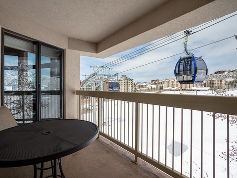 Sip your morning coffee on your private balcony while watching the gondola glide by—mountain adventures just steps away.