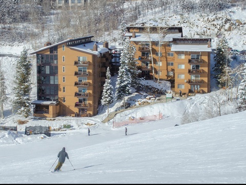 Ski-in/ski-out convenience at its finest—your mountain getaway awaits at the base of pristine slopes, surrounded by snow-dusted pines and alpine beauty.