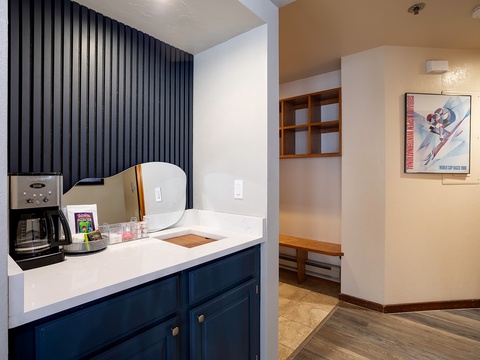 Your mornings start easy with fresh coffee ready to brew and a clean, convenient kitchenette just steps from your cozy space.