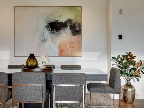 Your elegant dining space features modern furnishings and curated artwork, creating a sophisticated backdrop for memorable meals with loved ones.