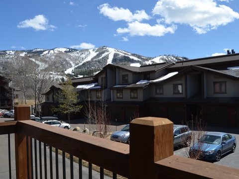Sweeping mountain vistas frame this peaceful alpine setting, with snow-dusted peaks and neighboring lodges creating the quintessential ski resort backdrop for your stay.