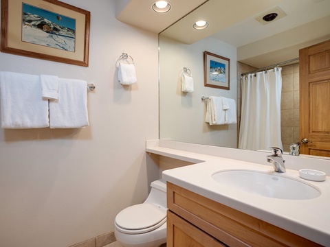 Freshen up in your private bathroom with crisp towels, a spacious vanity, and thoughtful touches that make every morning feel like a retreat.