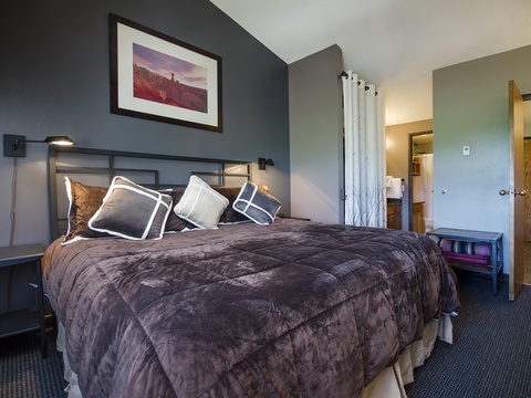 Sink into plush bedding and stylish comfort in your private retreat, complete with modern reading lights and thoughtful décor for a restful night's sleep.