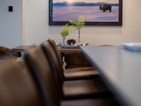 Gather around this inviting dining space with modern chairs and a warm wood table, where shared meals and laughter become your favorite vacation memories.