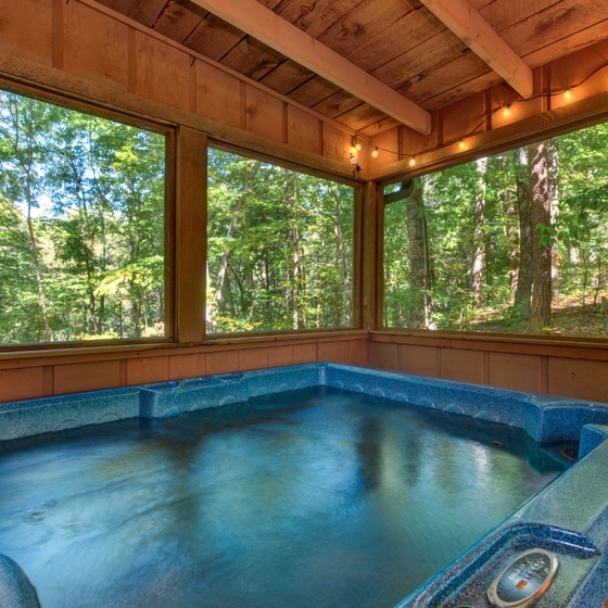 Whistling Woods Hideaway's bubbling hot tub