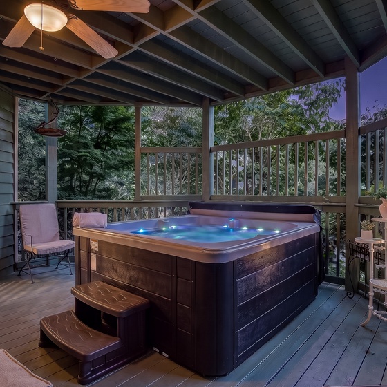 Soak under the stars in your private hot tub, where warm bubbles and forest views create your perfect evening sanctuary.