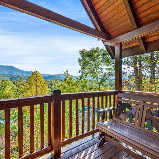 Some Peak Somewhere Cabin's deck with stunning views