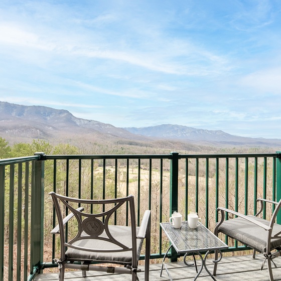 Sip your morning coffee on this private balcony while soaking in breathtaking mountain views that stretch endlessly across the horizon.