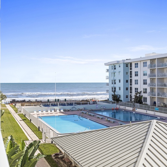 View of the Pool and Beach from Balcony