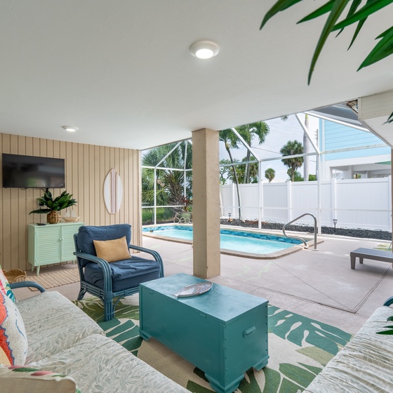 Enjoy the screened in pool area.