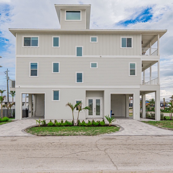 Start your getaway at Captain's Quarters at this charming beach vacation home.