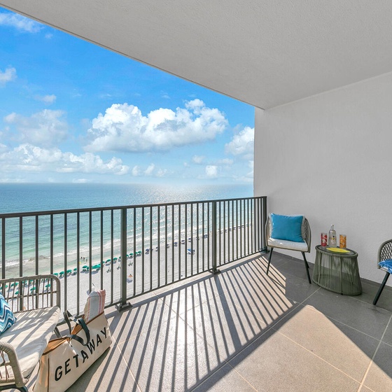 Your private balcony offers stunning gulf views where you can sip morning coffee while watching waves meet pristine white sand below.