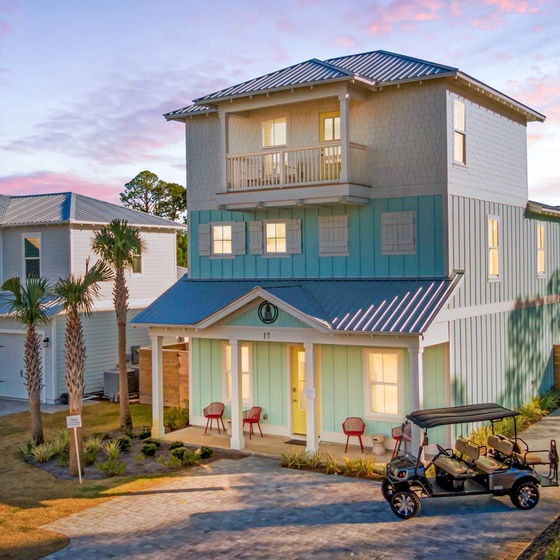 Front view of home with plenty of parking.