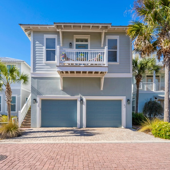 Simply The Beach - Charming studio carriage house with tropical landscaping and spacious garage in a peaceful beachside neighborhood.