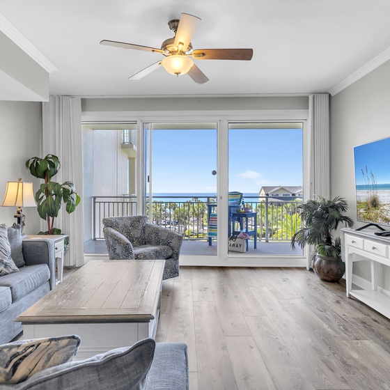 Wake up to stunning ocean views from your bright, beautifully furnished living room with direct balcony access.