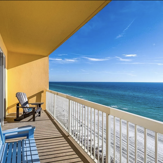 Step onto your private oceanfront balcony where comfortable seating awaits and endless sea views stretch to the horizon.