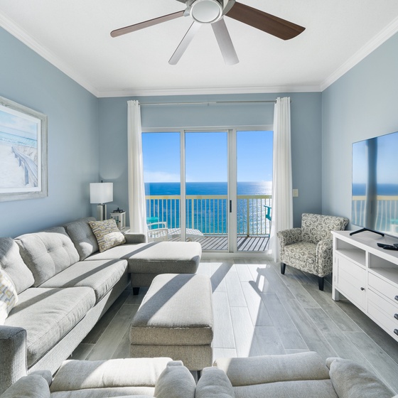 Sink into plush coastal comfort while soaking up breathtaking ocean views from your private balcony retreat.