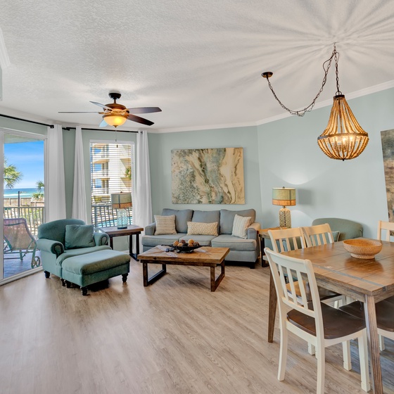 You'll love this bright, coastal living space where soft sea breezes flow through sliding doors to your private balcony.