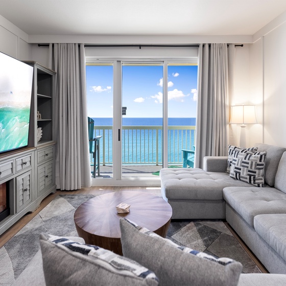 Your oceanfront living room beckons with plush seating and a warm fireplace. Step onto your private balcony to breathe in sea air.