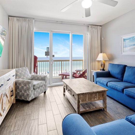 Relax in coastal comfort with ocean views from your private balcony and cozy seating perfect for unwinding after beach days.
