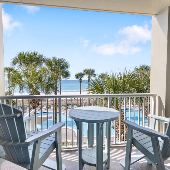 Sip your morning coffee on your private balcony while gazing at tropical palms and sparkling waters.