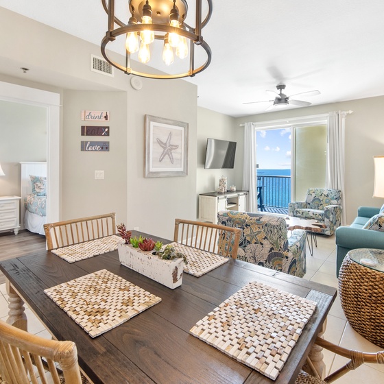 Relax in this bright, coastal-themed space where ocean views frame your mornings and evenings create perfect moments for connection.