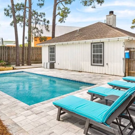 Your private pool oasis awaits with crystal blue waters and comfy lounge chairs for soaking up sunshine in complete privacy.