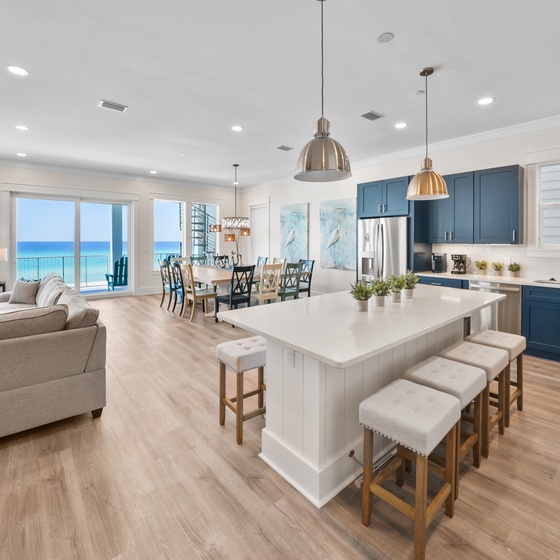 Step into your stunning ocean-view retreat where modern comfort meets coastal elegance. This open-concept space flows seamlessly from kitchen to living areas.