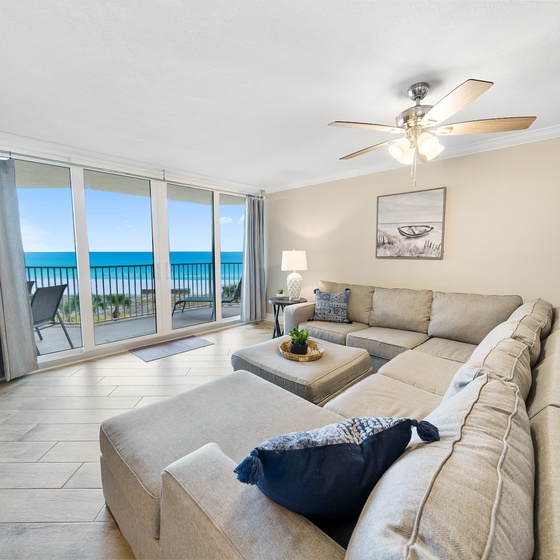 Sink into this plush sectional while breathtaking ocean views fill your living room through floor-to-ceiling windows.