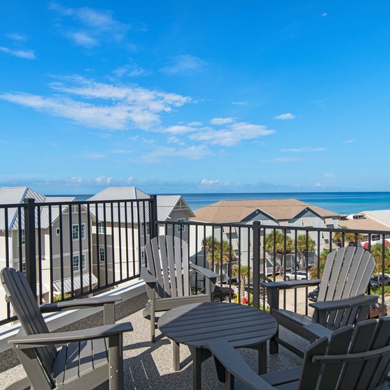 Relax in your private Adirondack chairs with stunning ocean views and refreshing sea breezes just steps from the beach.