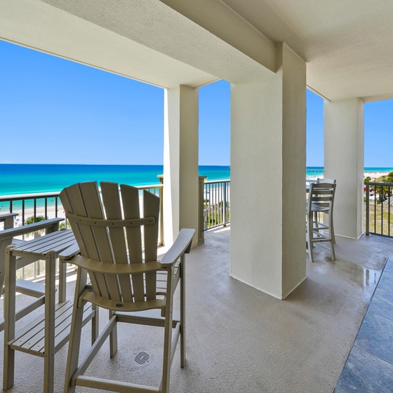Your private balcony frames stunning turquoise waters where you'll sip morning coffee and watch endless ocean views unfold.